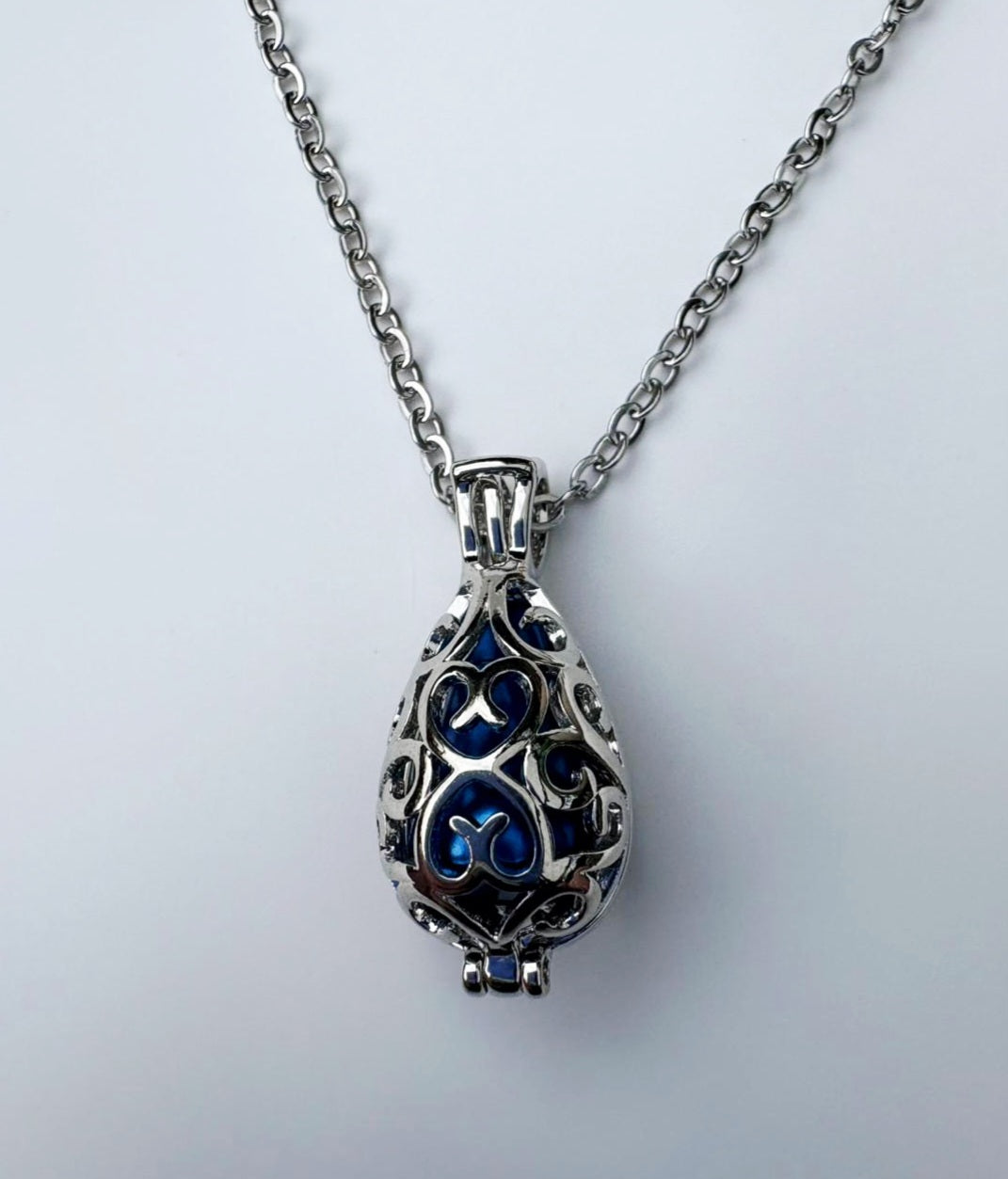 Blue Memorial Urn Pendant – Encased in Nature-Inspired Stainless Steel